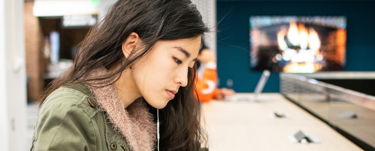 Student studying her class notes.